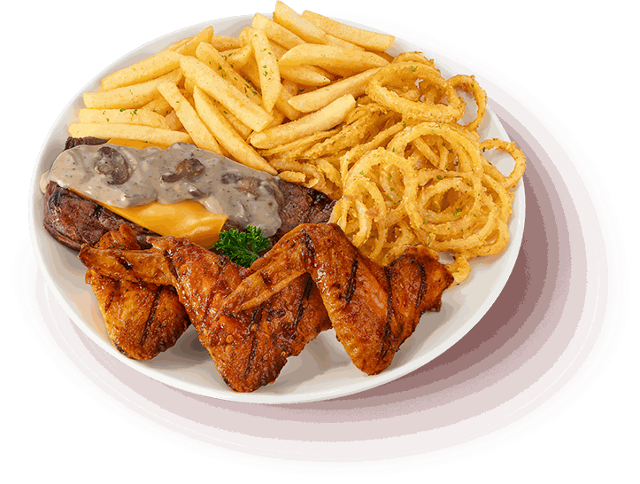 Chicken wings and streak grill with onion rings and chips