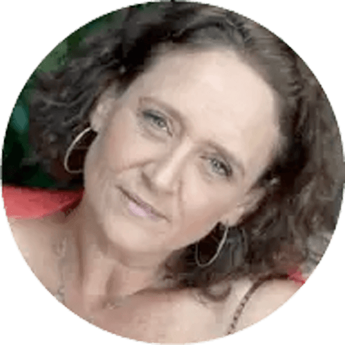 Susie Appleby, illustrator of a book called Monkey and Crocodile, looking into a camera.
