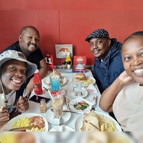 Family enjoying their wimpy meals