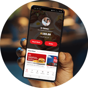 hand holding phone showing wimpy rewards app