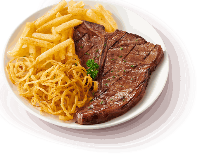 T-bone steak with onion rings and chips